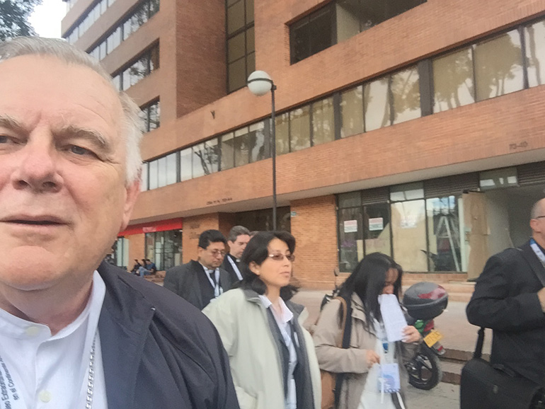 Archbishop Thomas Wenski took this selfie of himself walking in procession, with other delegates, to the Basilica of Our Lady of Lourdes in Bogota the afternoon of Aug. 27.