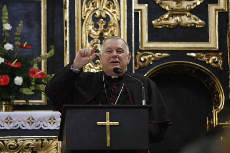 Archbishop Thomas Wenski teaches on the theme: Let us allow ourselves to be touched by God&#39;s mercy to a group of English-speaking pilgrims inside St. Catherine Church in Krakow, Poland.