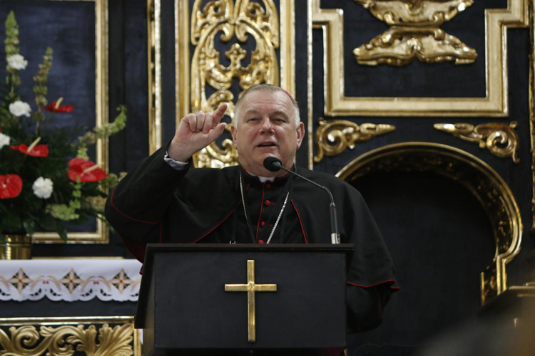 Archbishop Thomas Wenski teaches on the theme: Let us allow ourselves to be touched by God's mercy to a group of English-speaking pilgrims inside St. Catherine Church in Krakow, Poland.