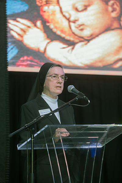 Sister Jane Stoecker, general superior of the Sisters of St. Joseph of St. Augustine, addresses the audience at the documentary's Miami premiere.