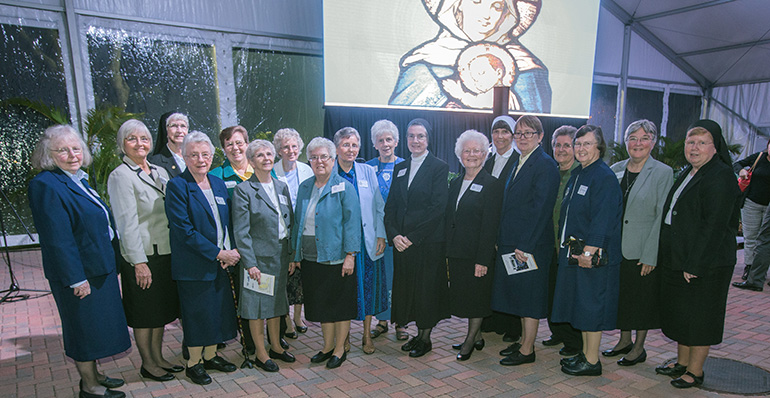 Sisters of St. Joseph of St. Augustine currently serving throughout Florida pose for a photo after the premiere of the documentary on their 150-year presence in the state, "A Legacy of Faith."