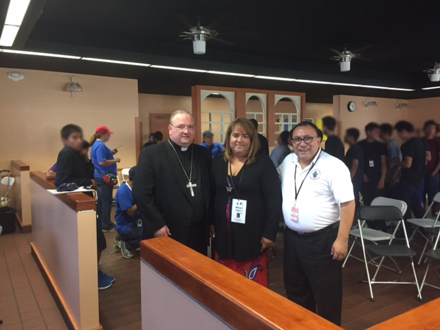From left to right, Bishop Peter Baldacchino,Auxiliary Bishop of Miami,Sayira Aquino, Religious Coordinador of the ORR Homestead Site, and Deacon Edgardo Farias, Director of the Archdiocese of Miami's Detention Ministry.