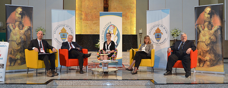 Panelists call for an end to the death penalty during the Justice to Mercy conference at Corpus Christi Church, Miami. From left are Mark Elliott, director of Floridians for Alternatives to the Death Penalty; George F. Kain, professor of justice and law administration at Western Connecticut State University, Ritchfield; Ingrid M. Delgado, associate for social concerns / respect life for the Florida Catholic Conference; Susan Recinella, a Catholic lay minister to families of executed persons; and Dale Recinella, a Catholic correctional chaplain for Florida's Death Row.