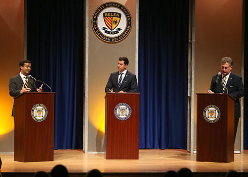 US Representative Carlos Curbelo (R-Fla), left, responds to questions from ABC News anchor and correspondent, Tom Llamas, during a debate against Democrat challenger Jose Garcia at their alma mater.