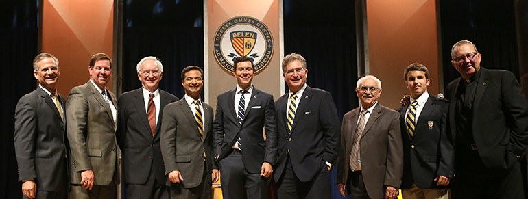 Posing for a photo after the debate, from left: Belen Alumni President Antonio Castro ’86, Principal Jose Roca '84, government teacher Patrick Collins, U.S. Congressman Carlos Curbelo ’98, ABC News anchor and debate moderator Tom Llamas ’97, former U.S. Congressman Joe Garcia ’82, Alumni Executive Director Mariano Loret de Mola ‘58, Student Council President Alejandro Smith ’17, and school President Father Guillermo Garcia-Tunon, SJ, ‘87.