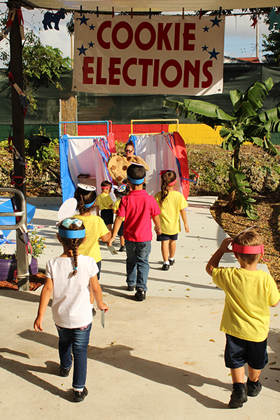 It's cookie election day: St. Michael the Archangel School students make their way to the voting booths to vote for their favorite cookie.