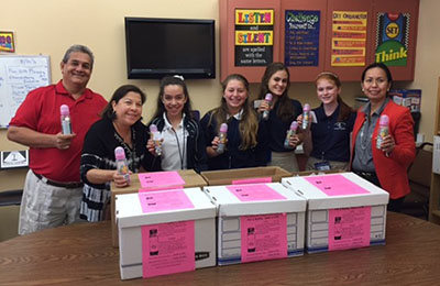 Joseph and Ximena Terneus, far left, respect life representatives for St. Bonaventure Parish, pose with the officers of St. Bonaventure School's National Junior Honor Society, which led the baby bottle campaign. From left: Kamila Trigueros, Romina Valerio, Francesca Zaccor, and Lily-Rose Sheedy, as well as resource teacher Stella DiBattista, the NJHS adviser.