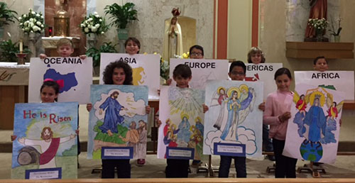 Sts. Peter and Paul students committed themselves to praying 13,000 rosaries, toward a worldwide goal of 13 million, after celebrating a Holy Hour Oct. 26, during which they remembered to pray for missions and Christian missionaries all over the world.