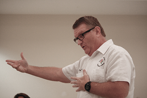 Deacon James Dugard responds to a question on the delicate topic of end-of-life issues at a monthly Women’s Prayer Muffin meeting held at St. Louis Church in Pinecrest.