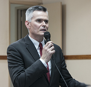 William Mulligan, president of the Miami Catholic Lawyers Guild, welcomes members to the reception that followed the Red Mass at Gesu Church Oct. 26.