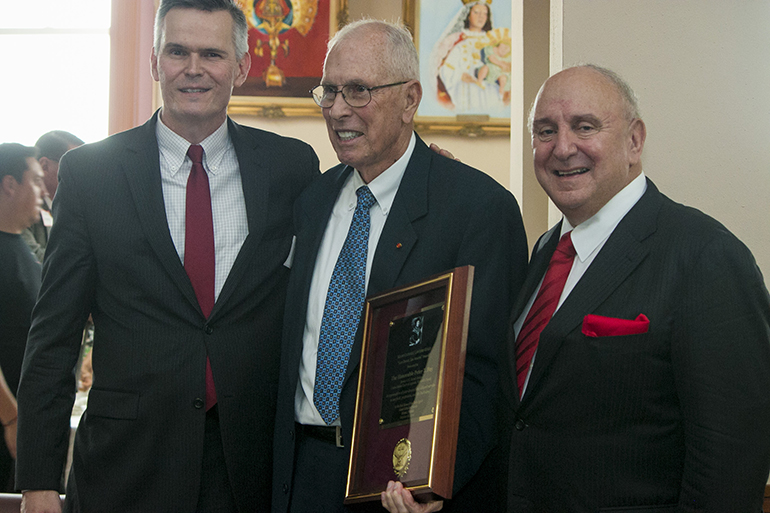 Judge Peter Fay, center, senior judge of the U.S. Court of Appeals, 11th Circuit, and recipient of this year's Lex Christi, Lex Amoris award, poses with Attorney Herbert Russomanno, right, last year's recipient, and William Mulligan, president of the Miami Catholic Lawyers Guild.