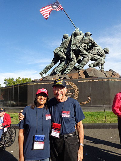 World War II veteran Carl Muscarello of All Saints Parish in Sunrise, and his guardian Sandy Thomas, pose in front of the Iwo Jima Memorial during their Oct. 29 Honor Flight South Florida to Washington, D.C.