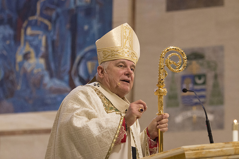 Archbishop Thomas Wenski preaches the homily during the Thanks-for-Giving Mass at St. Mary Cathedral Nov. 20.
