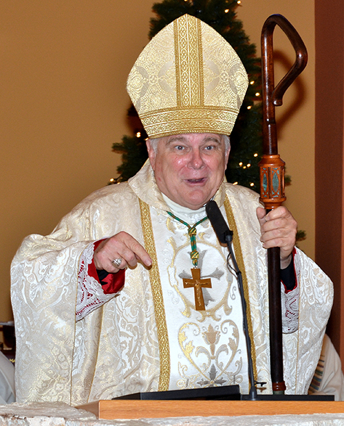 Archbishop Thomas Wenski preaches the homily at the 70th anniversary Mass for St. Thomas University.