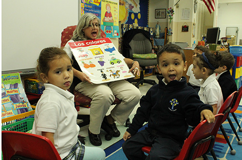 Rojo, azul, verde y mas. Pre-K2 teacher Priscilla Naumann teaches different colors in Spanish to her students as part of a Two Way Immersion Network for Catholic Schools (TWIN-CS) program that is integrating bilingual English/Spanish curriculum into Holy Rosary-St. Richard School.