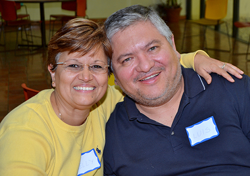 Nelly and Luis Silva pause during a break at the Fully Engaged seminar for archdiocesan mentoring couples.
