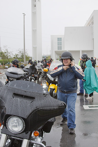 Archbishop Thomas Wenski prepares to lead the 2017 Archbishop’s Motorcycle Ride, whose proceeds benefit Catholic Charities’ St. Luke's Center, which offers treatment for people struggling with addictions. The ride began at Our Lady of Guadalupe Church in Doral and ended at Peterson’s Harley Davidson in North Miami.