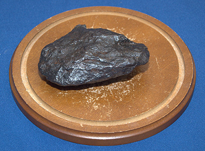 A meteorite was among the table centerpieces for a luncheon at Belen Jesuit Preparatory School during a visit by Brother Guy Joseph Consolmagno, director of the Vatican Observatory.