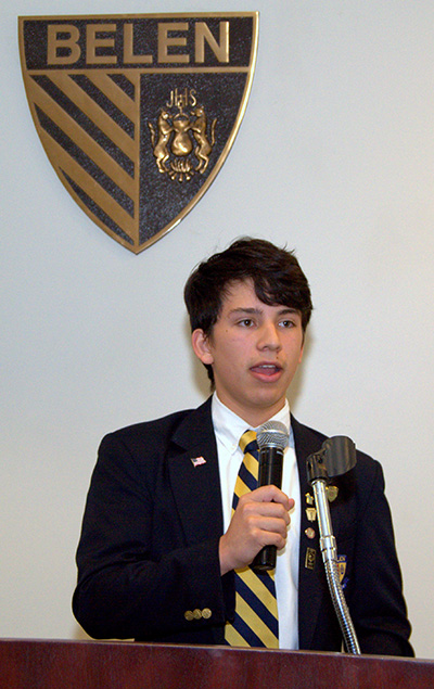 Esteban Guio, president of the Science National Honor Society at Belen Jesuit Preparatory School, introduces Jesuit Brother Guy Joseph Consolmagno, director of the Vatican Observatory.