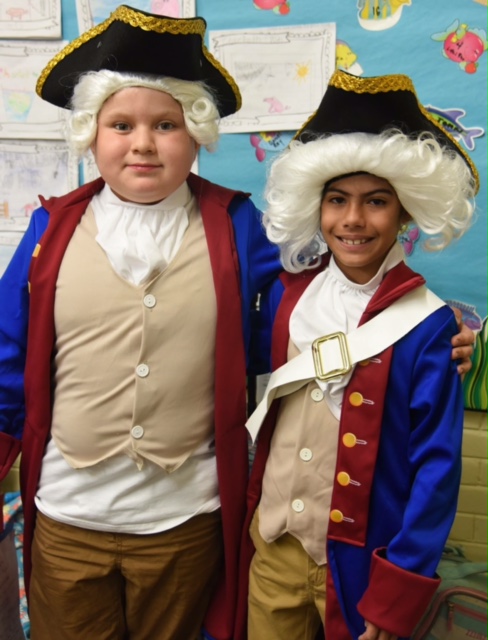 Gonzalo Buenaventura and Daniel Brito dress up as George Washington for the President's Day project at Sts. Peter and Paul School in Miami. The project was led by third grade teacher Jeanette Walled.