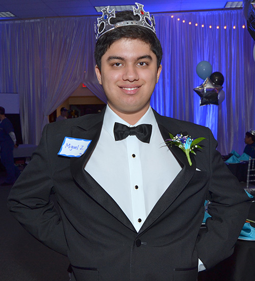 Miguel Zapata strikes a pose at the Night to Shine Prom at St. Bonaventure Church in Davie.
