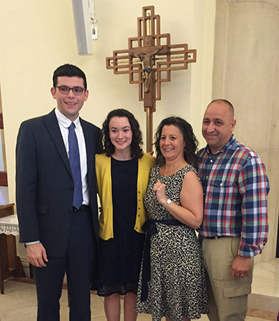 Groom-to-be Matthew Mangiaracina and his fiancéé, Lia Del Guercio, left, pose for a photo with Lisa and Jerry Forte, Del Guercio’s mother and stepfather, after the engaged couple’s betrothal ceremony.