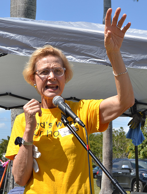 Lutheran pastor Kathryn H. Carroll gives instructions for a labyrinth groundbreaking at MorningStar Renewal Center.