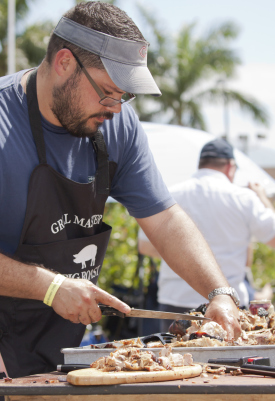 Martin Bech, a 1996 alumnus of Christopher Columbus High School, was one of 22 who participated at the Pig Roast Competition at the Marist Brothers 200th Anniversary Picnic.