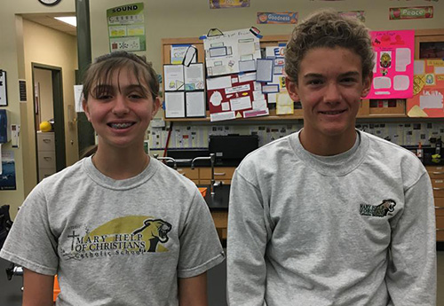 Sixth graders Victoria Servideo, left, and Rafael Opperman won fourth place and the Air Force Award, respectively, at this year's Broward regional science fair. They were two of the 10 entrants from Mary Help of Christians School in Parkland.