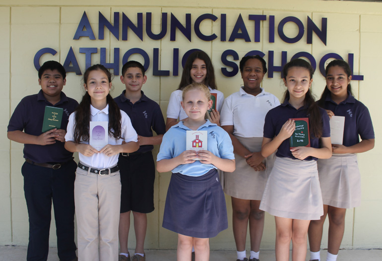 Annunciation School fifth graders were chosen to have their poetry published in the Anthology of Poetry by Young Americans. The young poets include (back row, left to right) Brian Guevara, Jason Romero, Paola Crespo, Kayley Alcindor, Sahara Rendon; (front row, left to right) Fabiola Solis, Hannah Russano, Isabella Tan Jun.