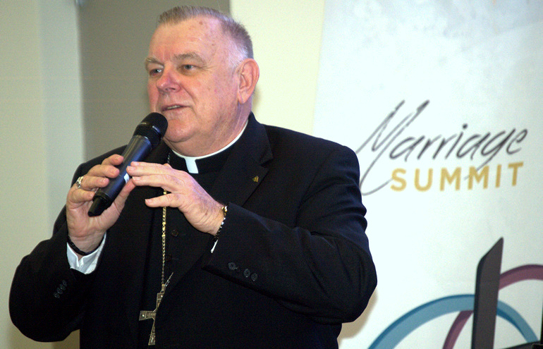 Marriage is a vocation like the priesthood, Archbishop Wenski said at the Marriage Summit at St. Brendan High School in Miami.