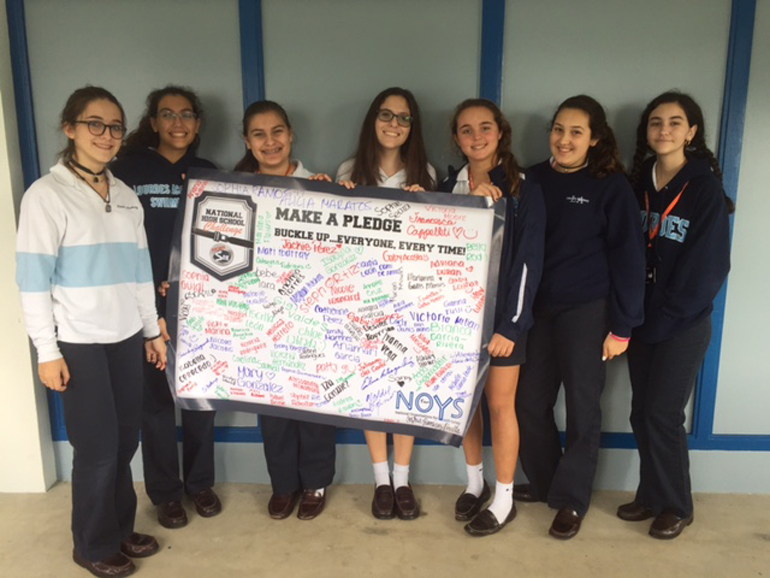 Our Lady of Lourdes Academy's SADD Chapter will receive a $ 1,500 prize from The National Road Safety Foundation for their successful campaign to increase seat belt usage among their fellow students.