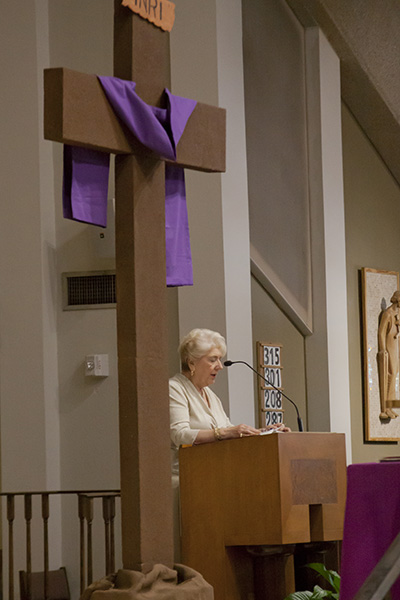 JoAnne Kralich, president of St. Gabriel's parish council proclaims the second reading during the Mass celebrating the parish's 50th anniversary.
