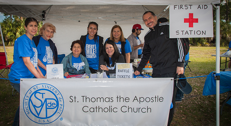 Members of St. Thomas the Apostle Parish's St. Vincent de Paul Conference were in charge of the First Aid station. The team was led by Father Matias Hualpa, parochial vicar at the church (far right).