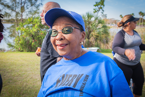 Terri Narine, a member of the St. Vincent de Paul Conference at Our Lady of Lourdes Church in Kendall, is all smiles after her "walk for the poor."