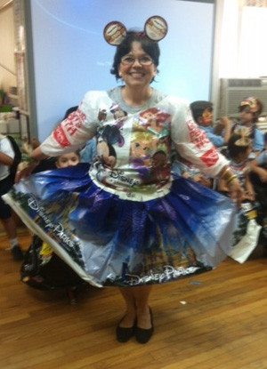 Who says recycling can't be fashionable? Sts. Peter and Paul teacher Mercy Maranges shows off her outfit made from recycled bags.