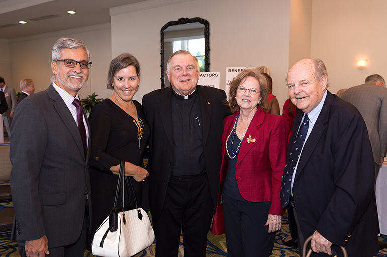 Richard Campillo, Karen Campillo, Anne James, and Bob James joined Miami Archbishop Thomas Wenski, center, at St. Anthony Parish in Fort Lauderdale for the 28th annual Red Mass of the St. Thomas More Society of South Florida.
