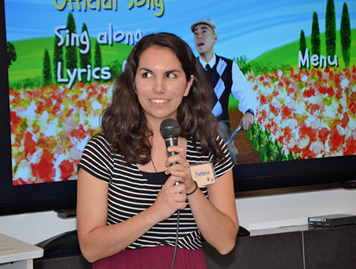 Kathleen Lantigua emcees the Instruments of Peace retreat, which she organized.