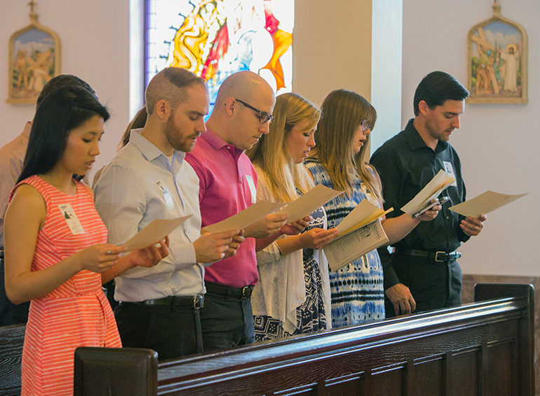 Nova University medical students recite the Catholic Hippocratic Oath after the Mass celebrated by members of the Miami Guild of the Catholic Medical Association. This was the guild's third annual Hippocratic Oath celebration at Mercy Hospital.