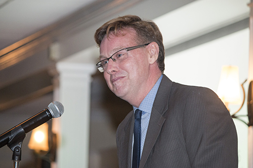 Randolph McGrorty, chief executive officer of Catholic Legal Services, tells 300 people gathered for the New American Awards dinner that the agency helped more than 9,000 impoverished immigrants last year.