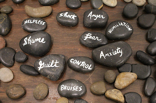 Leave no stone unturned: A tangible representation of the stones that victims of human trafficking use during therapy sessions with Susan Buzzi, a victim advocate and educator.