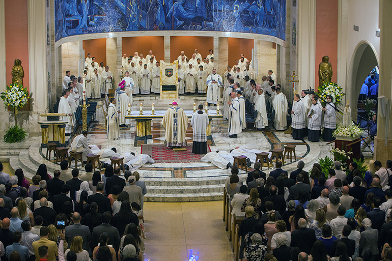 View of the ordination Mass from the loft of St. Mary Cathedral. The soon-to-be-priests lay prostrate in the sanctuary while the congregation prays the Litany of the Saints.