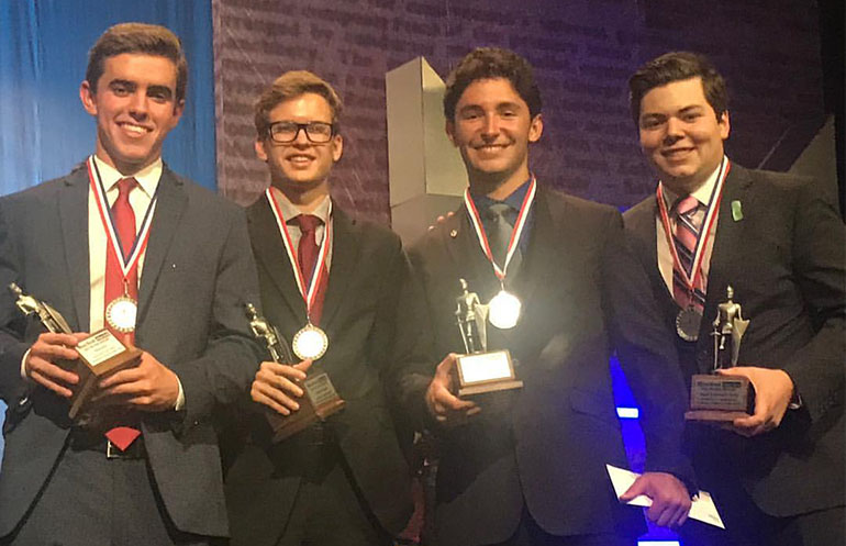 Christopher Columbus High School's Silver Knight award winners pose with their hardware, from left: David Sanchez, Kaelen Krumich, Jose Cardelle, and Anthony Martinez.