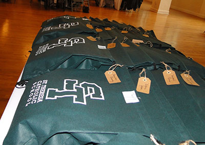 St. Theresa School's eighth-grade class received these high school survival kits at the alumni induction luncheon.