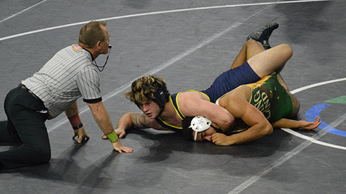 St. Thomas Aquinas student wrestler Josiah Gittman in action. He won a second consecutive individual title this year.