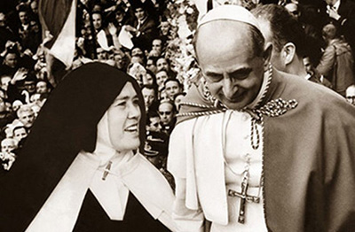 Blessed Pope Paul VI visits with Lucia, one of three shepherd children of Fatima, and the only one who survived past childhood. Sister Maria Lucia of Jesus and the Immaculate Heart spent 46 years as a contemplative in the cloister of the Carmel of St. Teresa, in Coimbra.