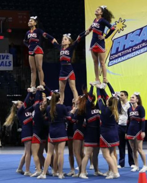 Chaminade-Madonna's cheerleading team, led by Coach Regina Moody, competes at the Florida High School Athletic Association's Competitive Cheerleading championship. They took fourth in the Medium Division Non-Tumbling finals.