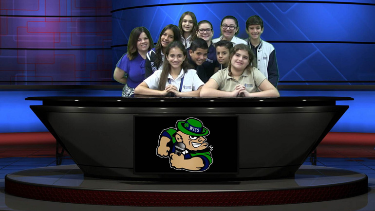 Members of Immaculate Conception School's WICS Celtic News team pose in the studio. Also in the photo is the school's media advisor, Tania Busto (left in blue).