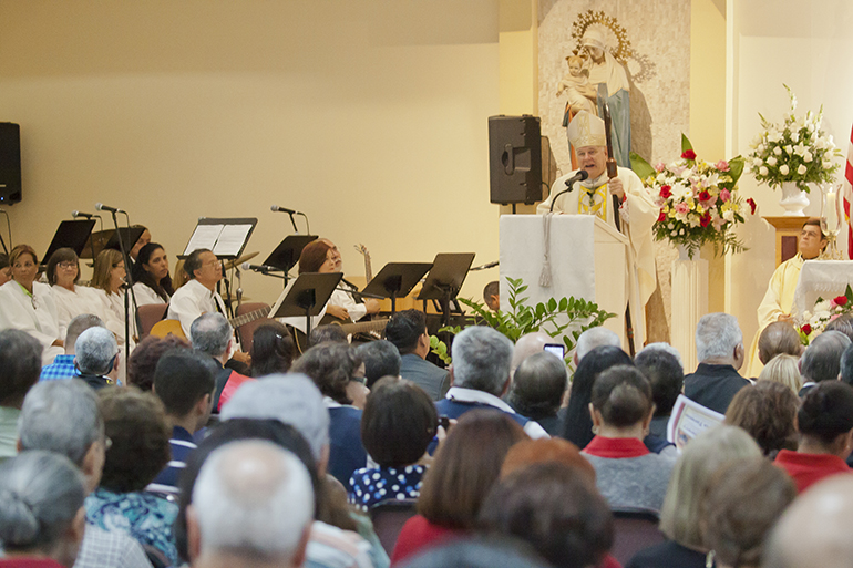 Parishioners of Santa Barbara take part June 17 in the 30th anniversary Mass for the parish, celebrated by Archbishop Thomas Wenski.