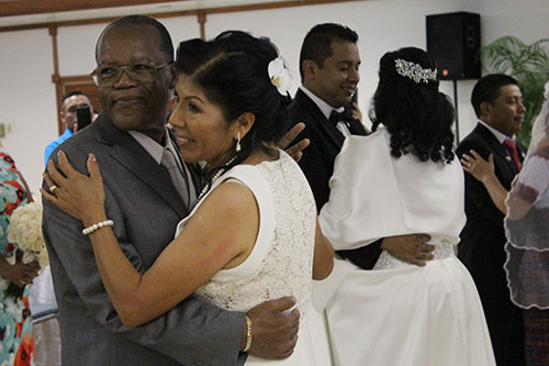 First dance: Newlyweds Leonard Lawrence and Zenaida Leon dance during their wedding reception.